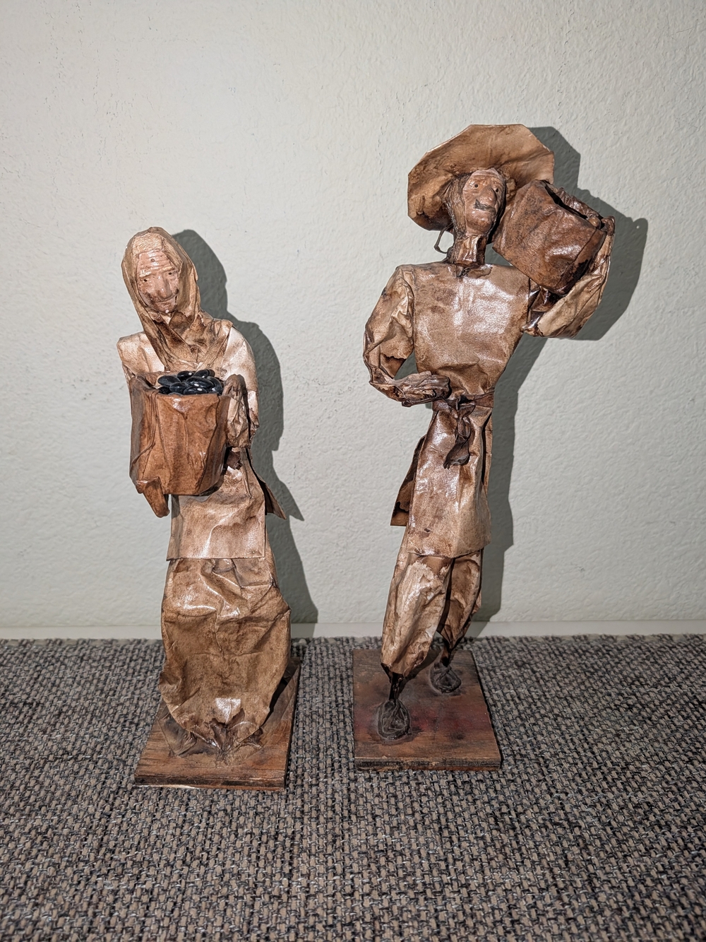 Man and woman Mexican paper mache figures